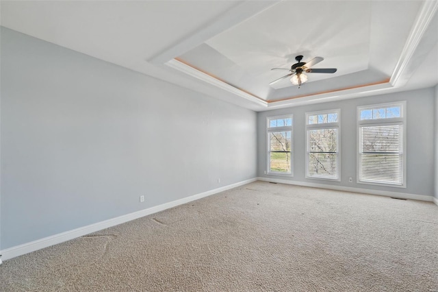 2707 Fairway Estates Dr, Wentzville, MO 63385 - spare room with a raised ceiling, baseboards, carpet flooring, and a ceiling fan