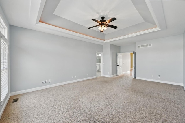 2707 Fairway Estates Dr, Wentzville, MO 63385 - carpeted empty room featuring a raised ceiling, a ceiling fan, and baseboards