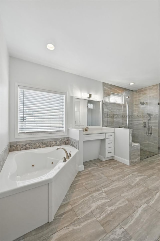 2707 Fairway Estates Dr, Wentzville, MO 63385 - full bathroom with a shower stall, a whirlpool tub, and vanity