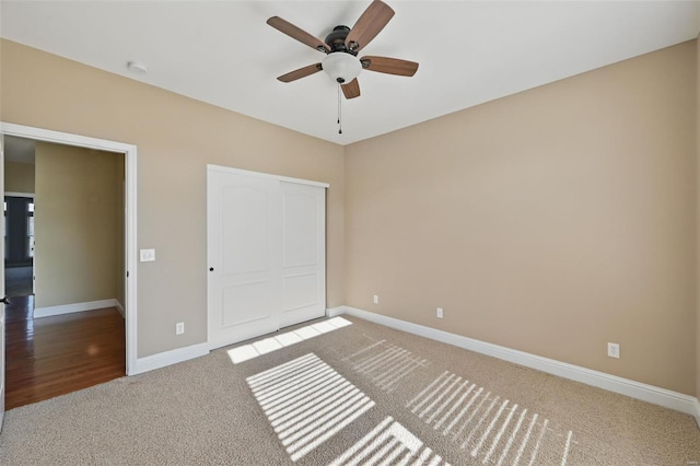 2707 Fairway Estates Dr, Wentzville, MO 63385 - unfurnished bedroom with light colored carpet, baseboards, a closet, and ceiling fan