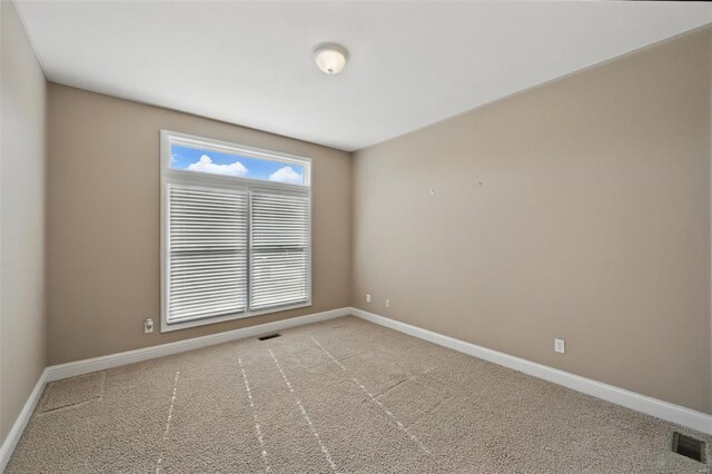 2707 Fairway Estates Dr, Wentzville, MO 63385 - carpeted spare room with baseboards
