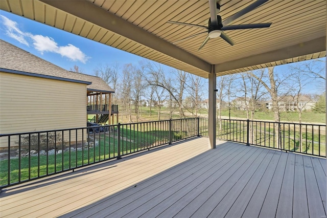 2707 Fairway Estates Dr, Wentzville, MO 63385 - deck featuring ceiling fan, a yard, and stairs
