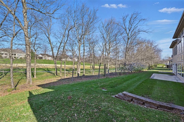 2707 Fairway Estates Dr, Wentzville, MO 63385 - view of green lawn featuring a patio area