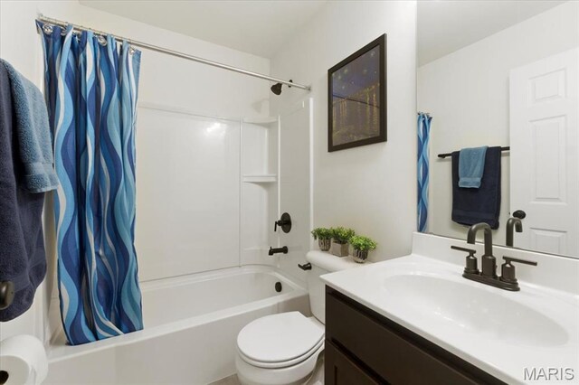 16783 River Stone Dr, Florissant, MO 63031 - bathroom with toilet, shower / tub combo with curtain, and vanity