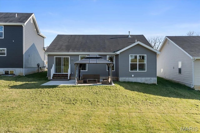 16783 River Stone Dr, Florissant, MO 63031 - back of property featuring a patio area, an outdoor hangout area, a gazebo, a yard, and entry steps