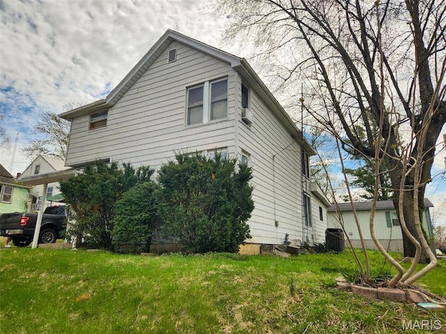 760 Swanwick St, Chester, IL 62233 - view of side of property with central air condition unit and a lawn