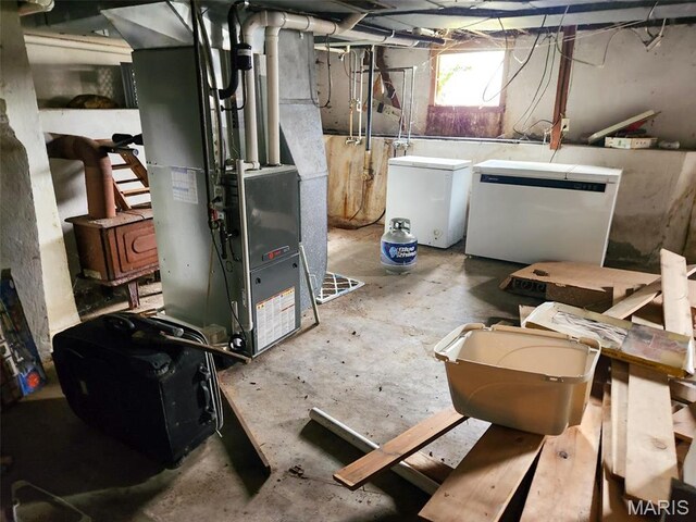760 Swanwick St, Chester, IL 62233 - basement with refrigerator and heating unit