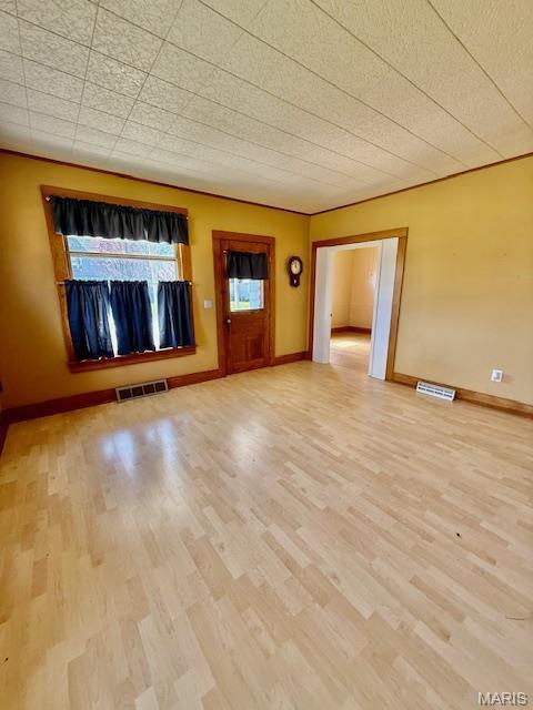 201 W Barr Ave, Jerseyville, IL 62052 - spare room with light wood-type flooring and baseboards