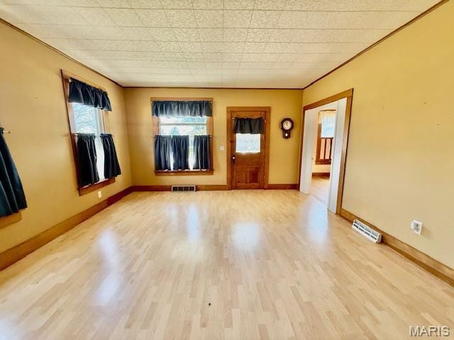 201 W Barr Ave, Jerseyville, IL 62052 - empty room featuring wood finished floors and baseboards