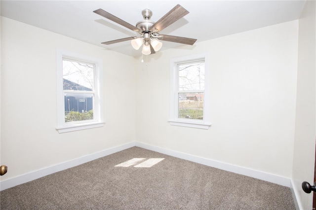 106 N A St, Cuba, MO 65453 - empty room with carpet floors, baseboards, and a ceiling fan