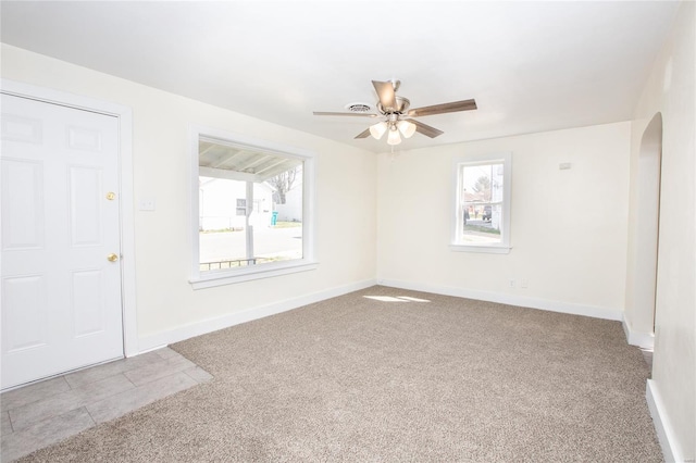 106 N A St, Cuba, MO 65453 - unfurnished room featuring carpet floors, plenty of natural light, ceiling fan, and baseboards