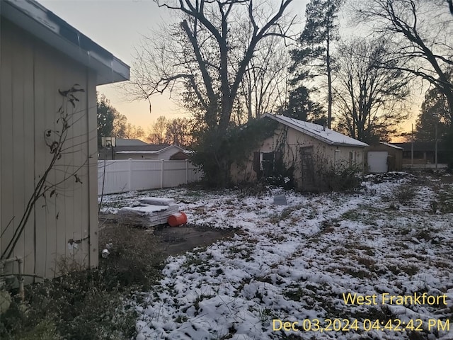 310 S Odle, West Frankfort, IL 62896 - yard layered in snow with fence