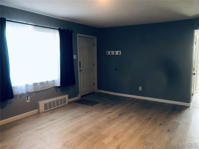 6990 Colonial Woods Dr Unit 59, Saint Louis, MO 63129 - empty room featuring wood finished floors and baseboards