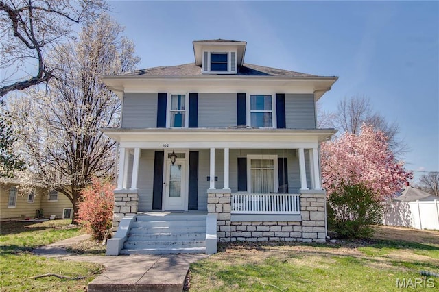 502 N State St, Jerseyville, IL 62052 - american foursquare style home featuring a porch
