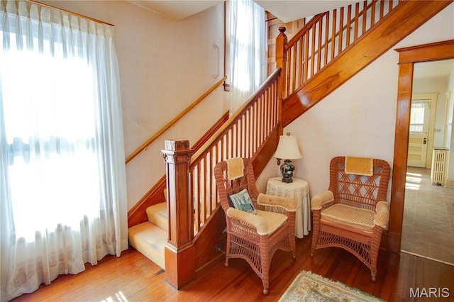 502 N State St, Jerseyville, IL 62052 - stairs with plenty of natural light and wood finished floors