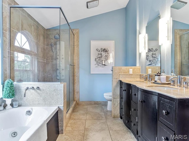 157 Knob Creek Ln, Ofallon, IL 62269 - bathroom featuring a whirlpool tub, a stall shower, double vanity, and tile patterned flooring