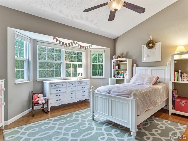 157 Knob Creek Ln, Ofallon, IL 62269 - bedroom with wood finished floors, vaulted ceiling, and a ceiling fan
