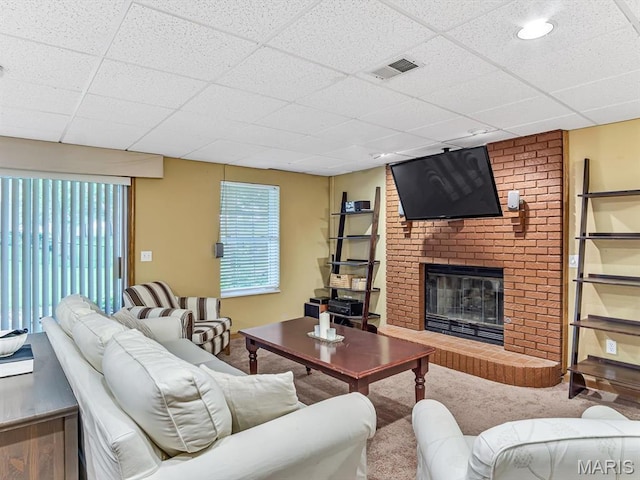 157 Knob Creek Ln, Ofallon, IL 62269 - carpeted living area with a fireplace and a paneled ceiling