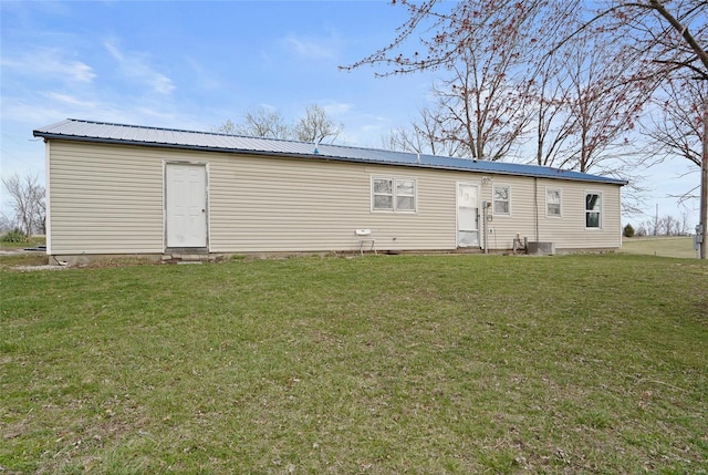 23425 N Everett Carr Rd, Mo, MO 65243 - rear view of property with a yard, metal roof, and entry steps