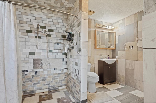 23425 N Everett Carr Rd, Mo, MO 65243 - full bath featuring tiled shower, toilet, vanity, and a textured ceiling