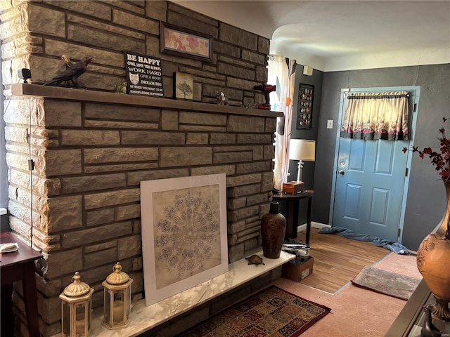861 Pershing Blvd E, St Louis, IL 62203 - living room featuring wood finished floors and a fireplace