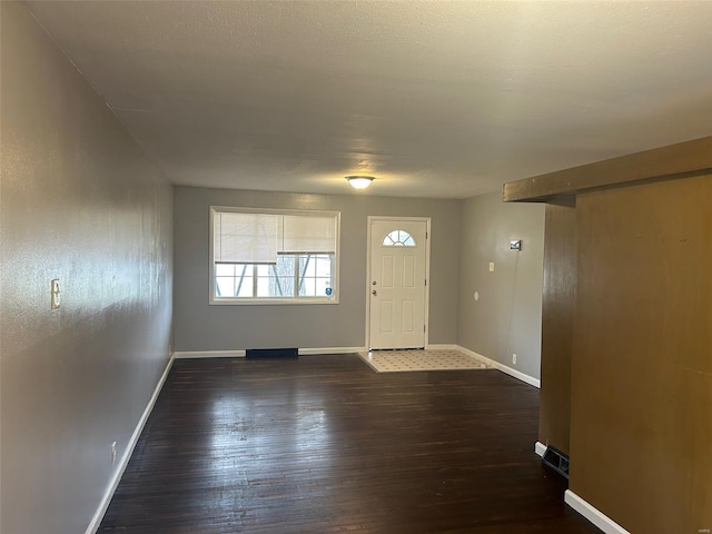10314 Viscount Dr, Saint Louis, MO 63136 - entrance foyer featuring hardwood / wood-style floors and baseboards