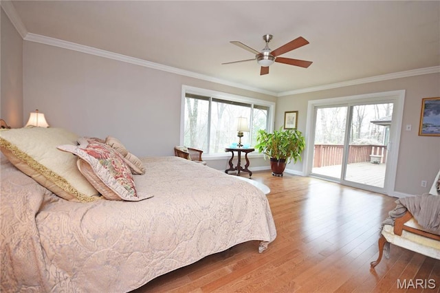 bedroom featuring access to outside, wood finished floors, crown molding, baseboards, and ceiling fan