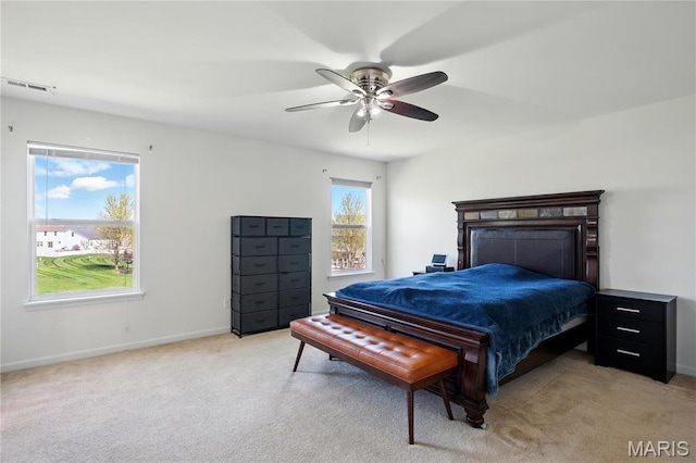 1914 Teresa Fields Ln, Lake St Louis, MO 63367 - bedroom with light colored carpet, baseboards, and ceiling fan