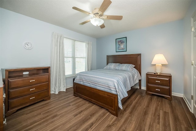 173 Silo View Dr Unit 393A, Wentzville, MO 63385 - bedroom featuring dark wood-style floors, baseboards, and a ceiling fan