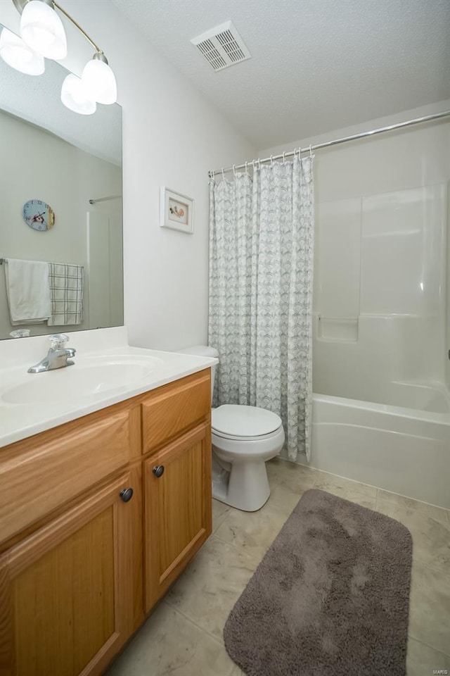 173 Silo View Dr Unit 393A, Wentzville, MO 63385 - bathroom featuring toilet, shower / bath combo with shower curtain, and vanity