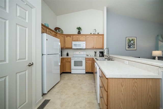 173 Silo View Dr Unit 393A, Wentzville, MO 63385 - kitchen featuring white appliances, a sink, a peninsula, lofted ceiling, and light countertops