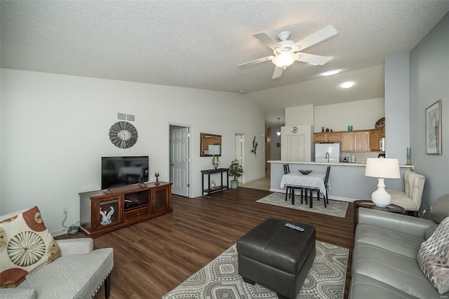 173 Silo View Dr Unit 393A, Wentzville, MO 63385 - living room featuring lofted ceiling, ceiling fan, dark wood finished floors, and a textured ceiling