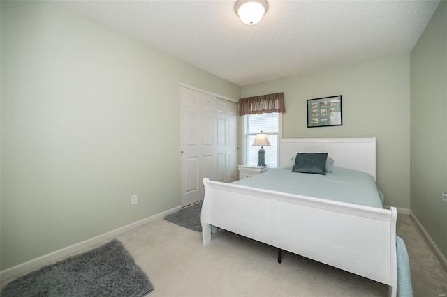 173 Silo View Dr Unit 393A, Wentzville, MO 63385 - carpeted bedroom featuring baseboards and a closet