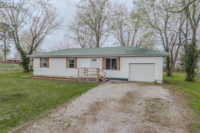 1425 Cedar Dr, Lebanon, MO 65536 - ranch-style house featuring crawl space, an attached garage, driveway, metal roof, and a front yard
