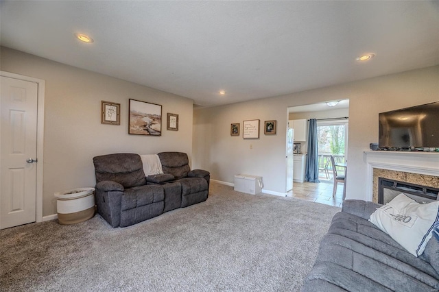 1425 Cedar Dr, Lebanon, MO 65536 - living room featuring carpet flooring, baseboards, recessed lighting, and a fireplace