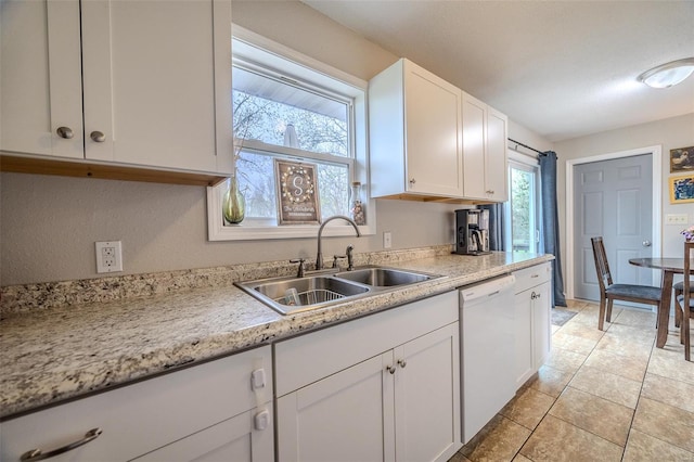 1425 Cedar Dr, Lebanon, MO 65536 - kitchen featuring white dishwasher, a sink, and white cabinets