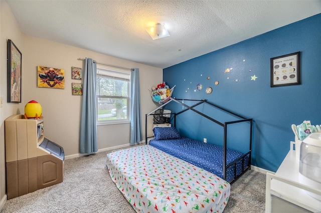 1425 Cedar Dr, Lebanon, MO 65536 - bedroom featuring carpet flooring, a textured ceiling, and baseboards