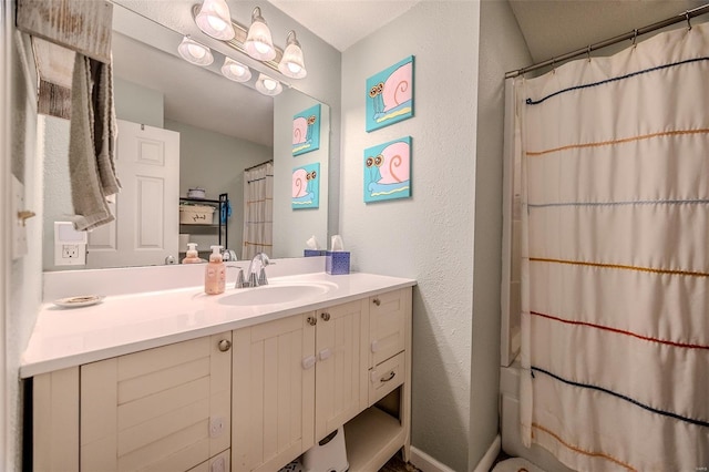 1425 Cedar Dr, Lebanon, MO 65536 - bathroom with vanity, curtained shower, and a textured wall