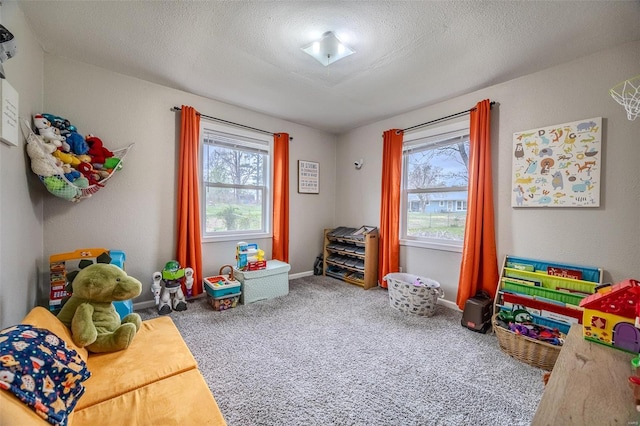 1425 Cedar Dr, Lebanon, MO 65536 - playroom with baseboards, carpet flooring, and a textured ceiling