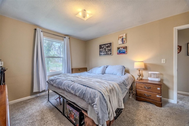 1425 Cedar Dr, Lebanon, MO 65536 - bedroom featuring carpet floors, baseboards, and a textured ceiling