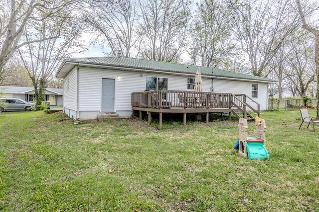 1425 Cedar Dr, Lebanon, MO 65536 - back of house featuring a deck and metal roof