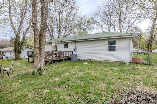 1425 Cedar Dr, Lebanon, MO 65536 - rear view of property with a wooden deck, crawl space, and central air condition unit