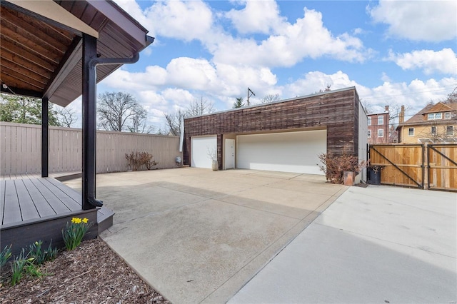 5089 Waterman Blvd, Saint Louis, MO 63108 - detached garage with fence and a gate