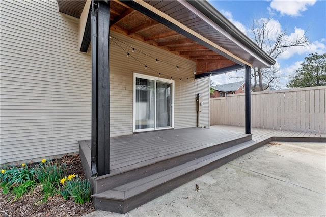 5089 Waterman Blvd, Saint Louis, MO 63108 - view of patio featuring a wooden deck and fence