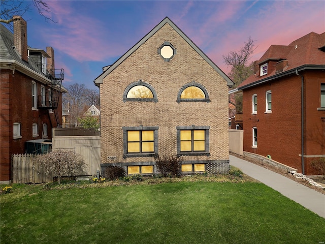 5089 Waterman Blvd, Saint Louis, MO 63108 - back of property at dusk with brick siding