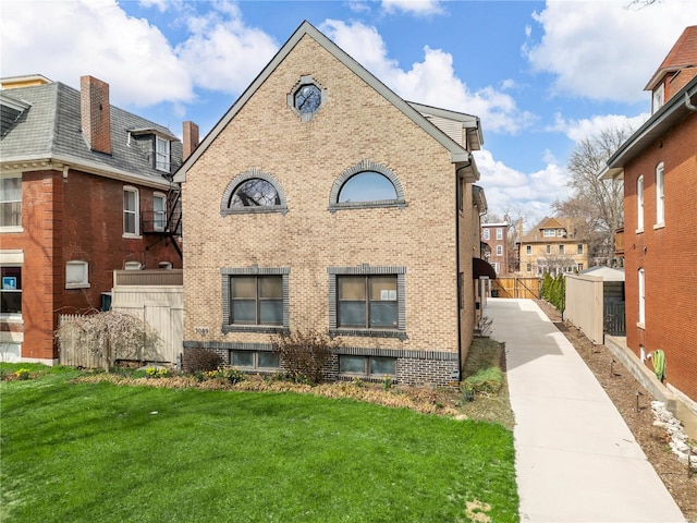 5089 Waterman Blvd, Saint Louis, MO 63108 - view of property exterior with brick siding