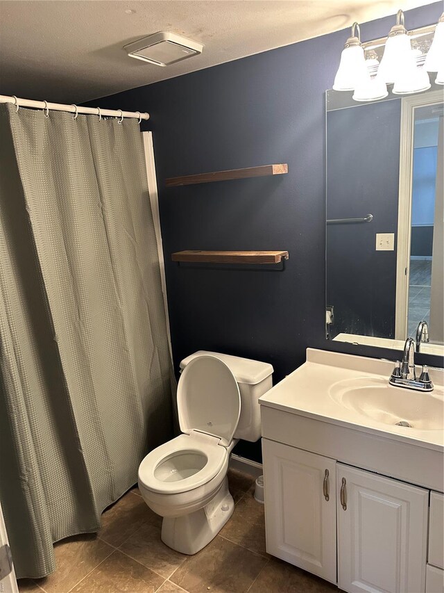 1459 Bobolink Pl, Saint Louis, MO 63144 - full bath with toilet, vanity, a chandelier, and tile patterned floors