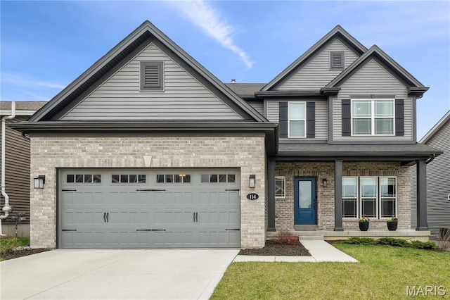 traditional-style house featuring brick siding, concrete driveway, a front lawn, and a garage