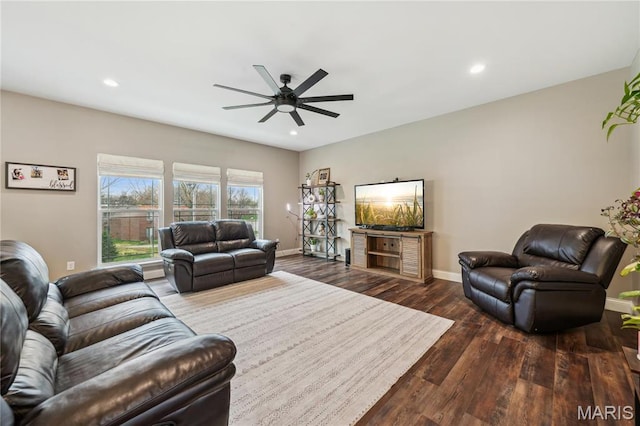 living area with ceiling fan, baseboards, dark wood-style flooring, and recessed lighting