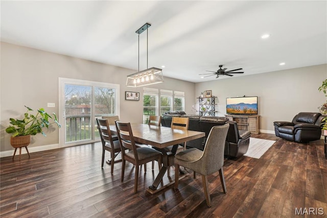 dining room featuring dark wood finished floors, recessed lighting, baseboards, and ceiling fan